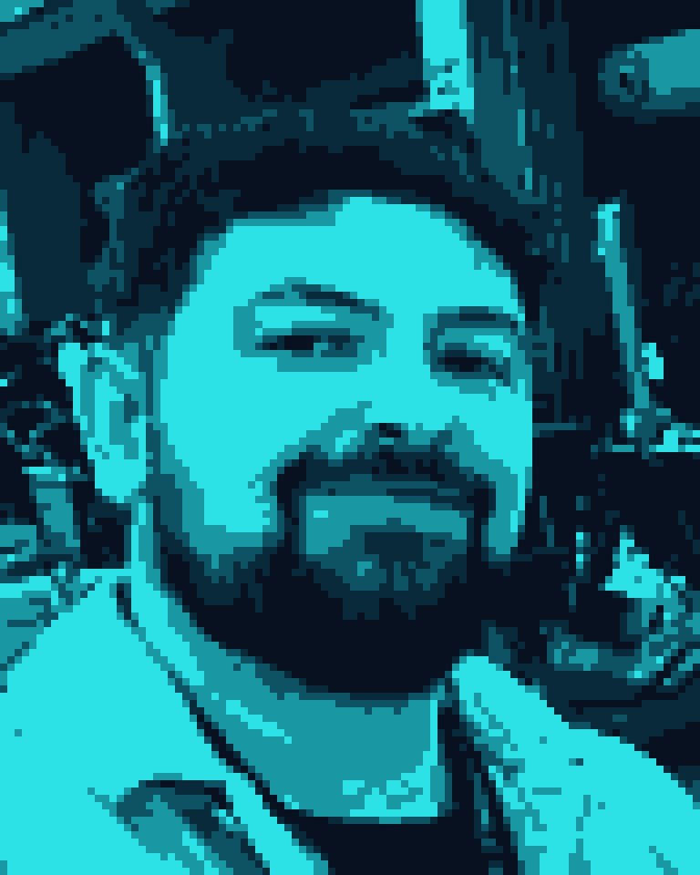 Jorge Núñez López en un evento de desarrollo de videojuegos, retrato en pixel art cian